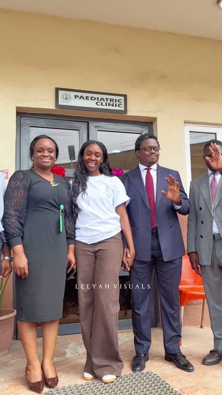 Kunbi Kares team with hospital stakeholders outside the Paediatric Clinic