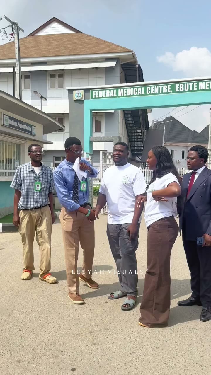 The team and hospital stakeholders on site at the Federal Medical Centre gate