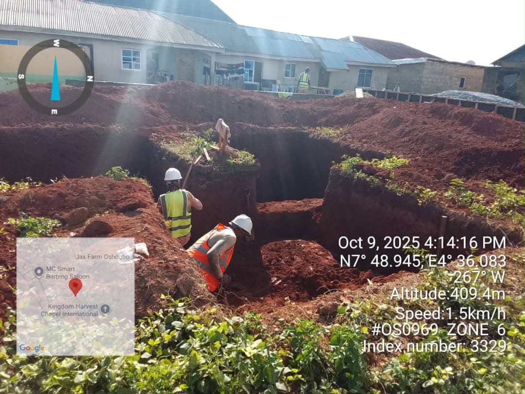Site team excavating trench foundations at the start of a build