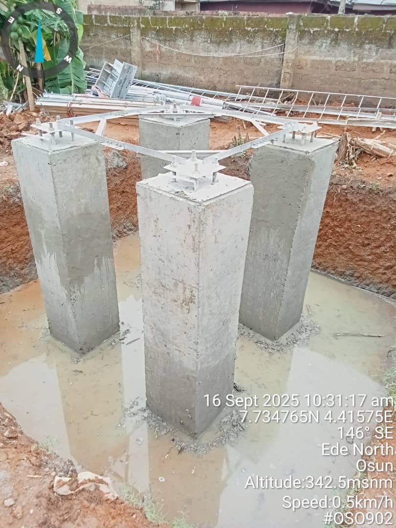 Concrete foundation piers set during construction